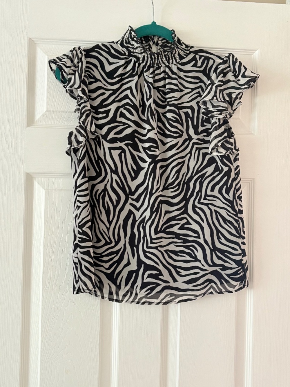 1. State Zebra Sleeveless Blouse